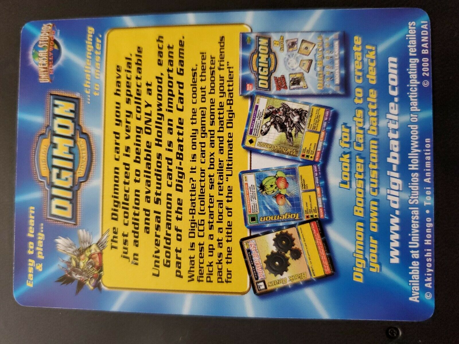 UN-01 Universal Studios Promo Goldramon Paper Insert Front