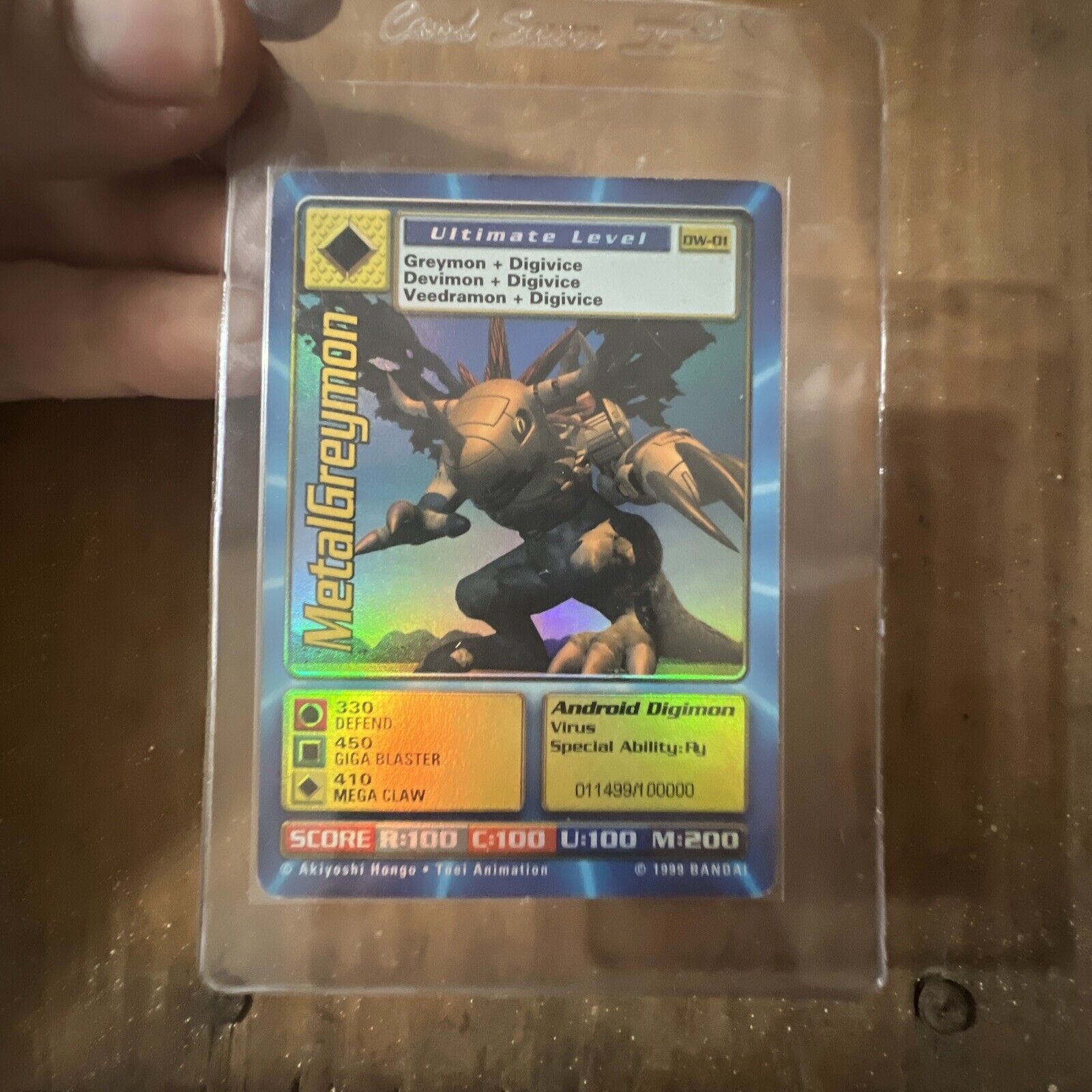 Digimon World Promo Card DW-01, serialized number 011499