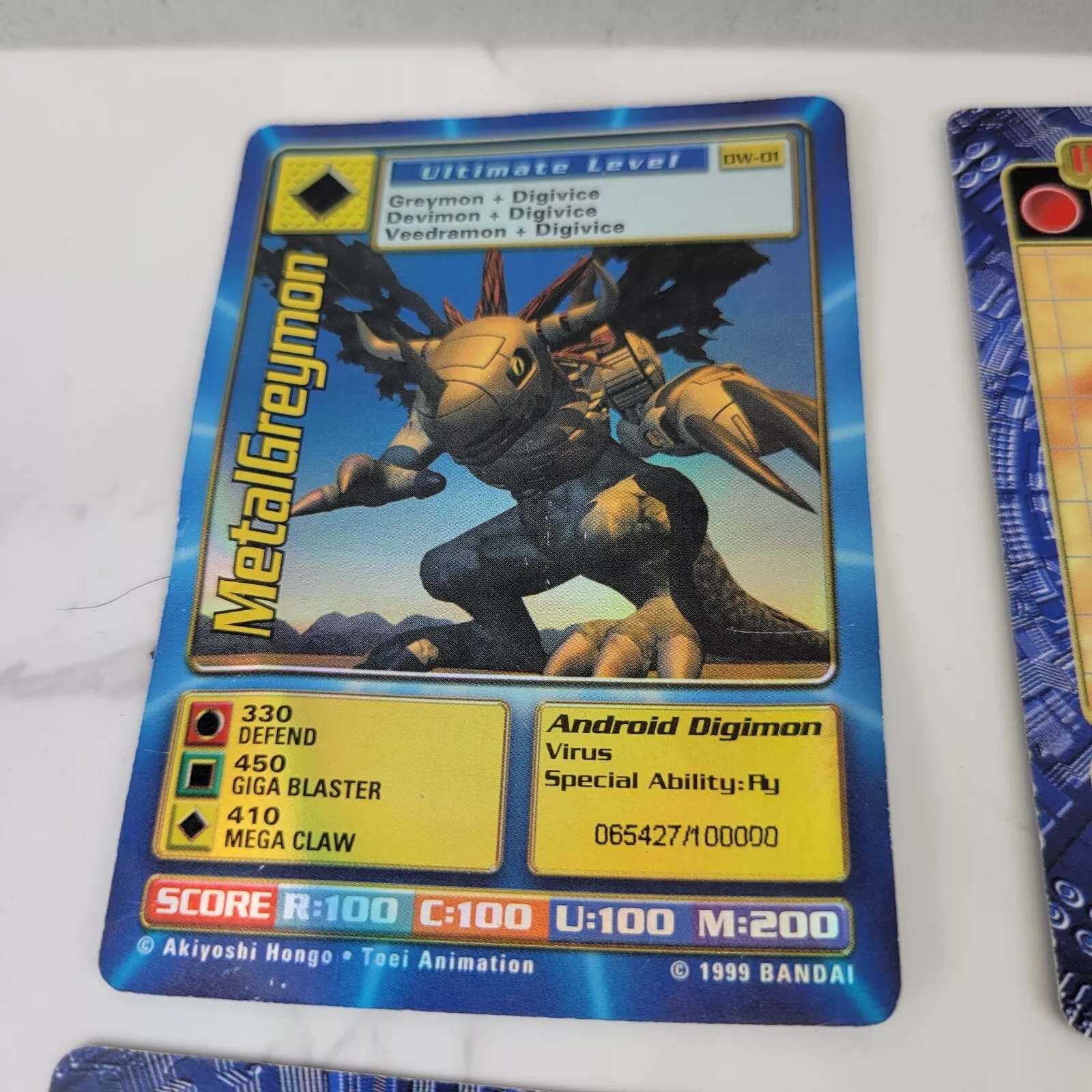 Digimon World Promo Card DW-01, serialized number 065427
