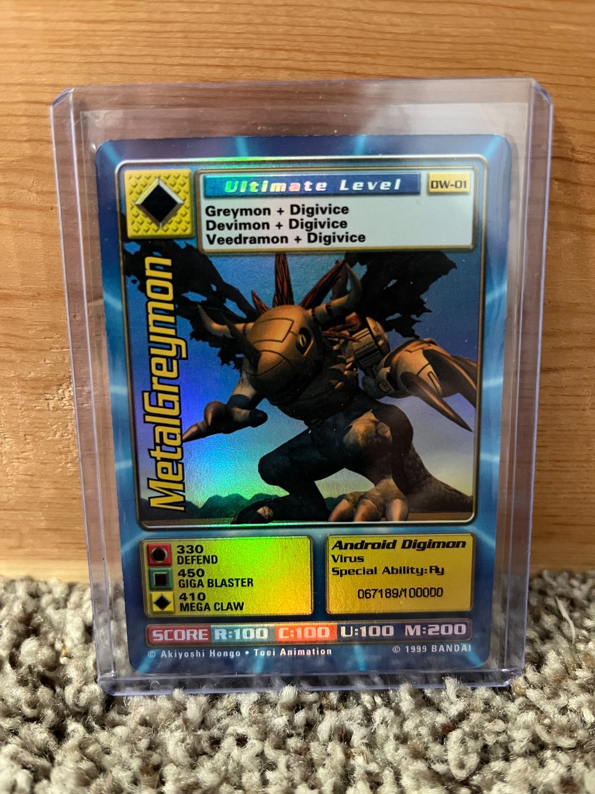 Digimon World Promo Card DW-01, serialized number 067189